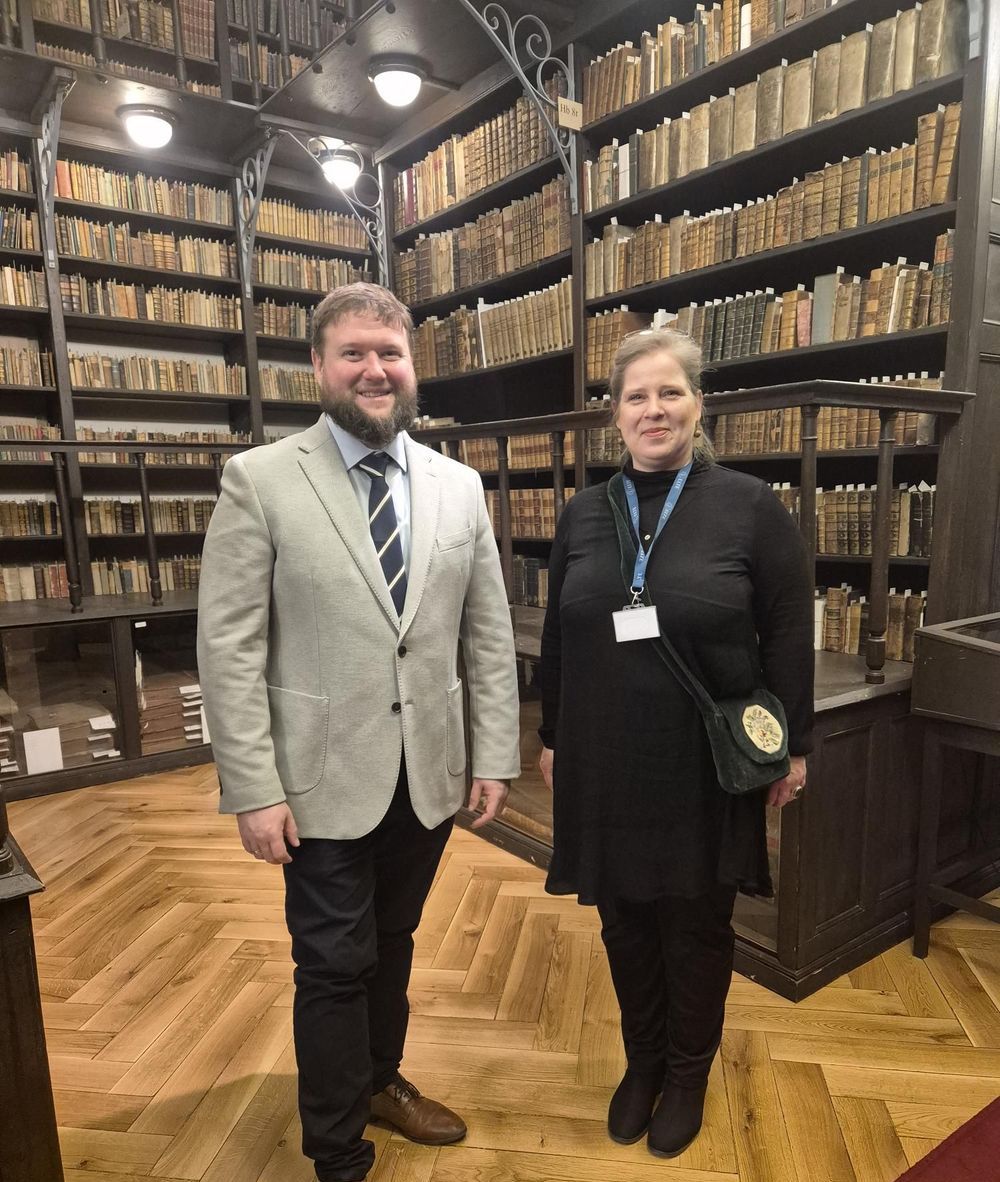 Máté Vincze, Deputy State Secretary, and László Szende, PhD, Head of Department, on a library visit